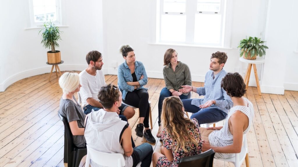 You’re Not Alone Picture someone feeling nervous during their first group session. Over time, they realize everyone is supportive and rooting for each other’s success.